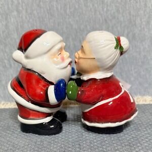 Collections Etc Magnetic Kissing Santa and Mrs Claus Salt and Pepper Shaker Set